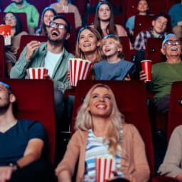 People watch a movie in a theater